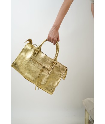 Clara gold bag ouvre sa boutique