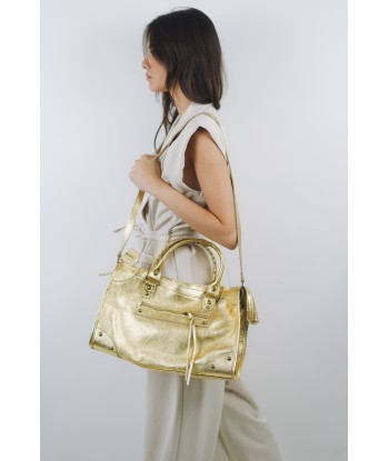 Clara gold bag ouvre sa boutique